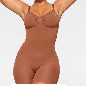 SKIMS SCULPT MID THIGH BODYSUIT BRONZE SMALL NWT in packaging